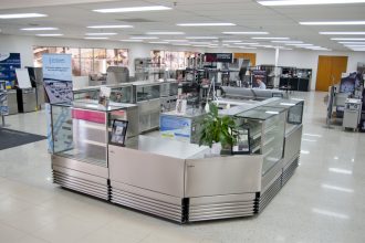 Commercial kitchen equipment sits in the middle of a showroom