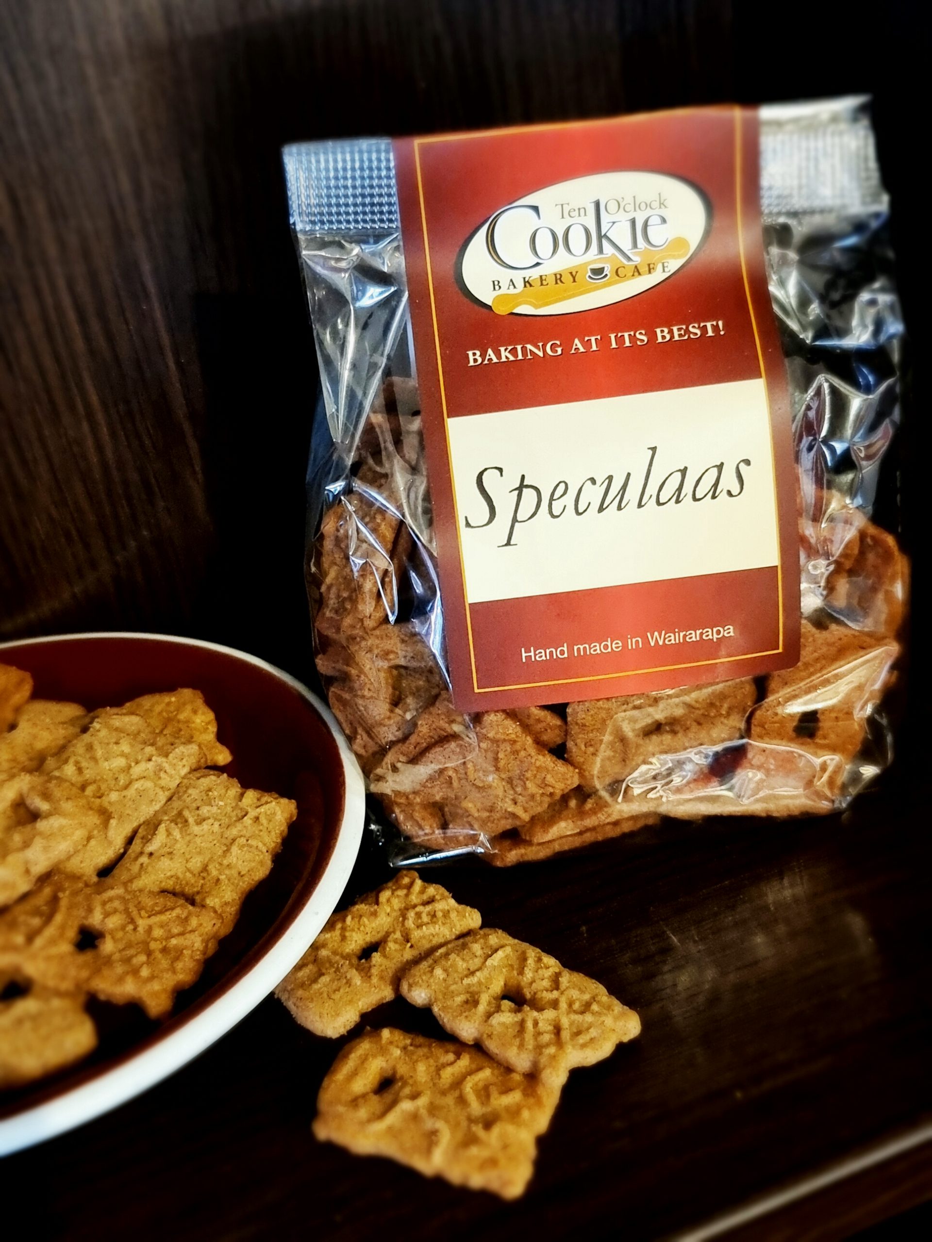 packet of speculaas biscuits on plate and in packaging