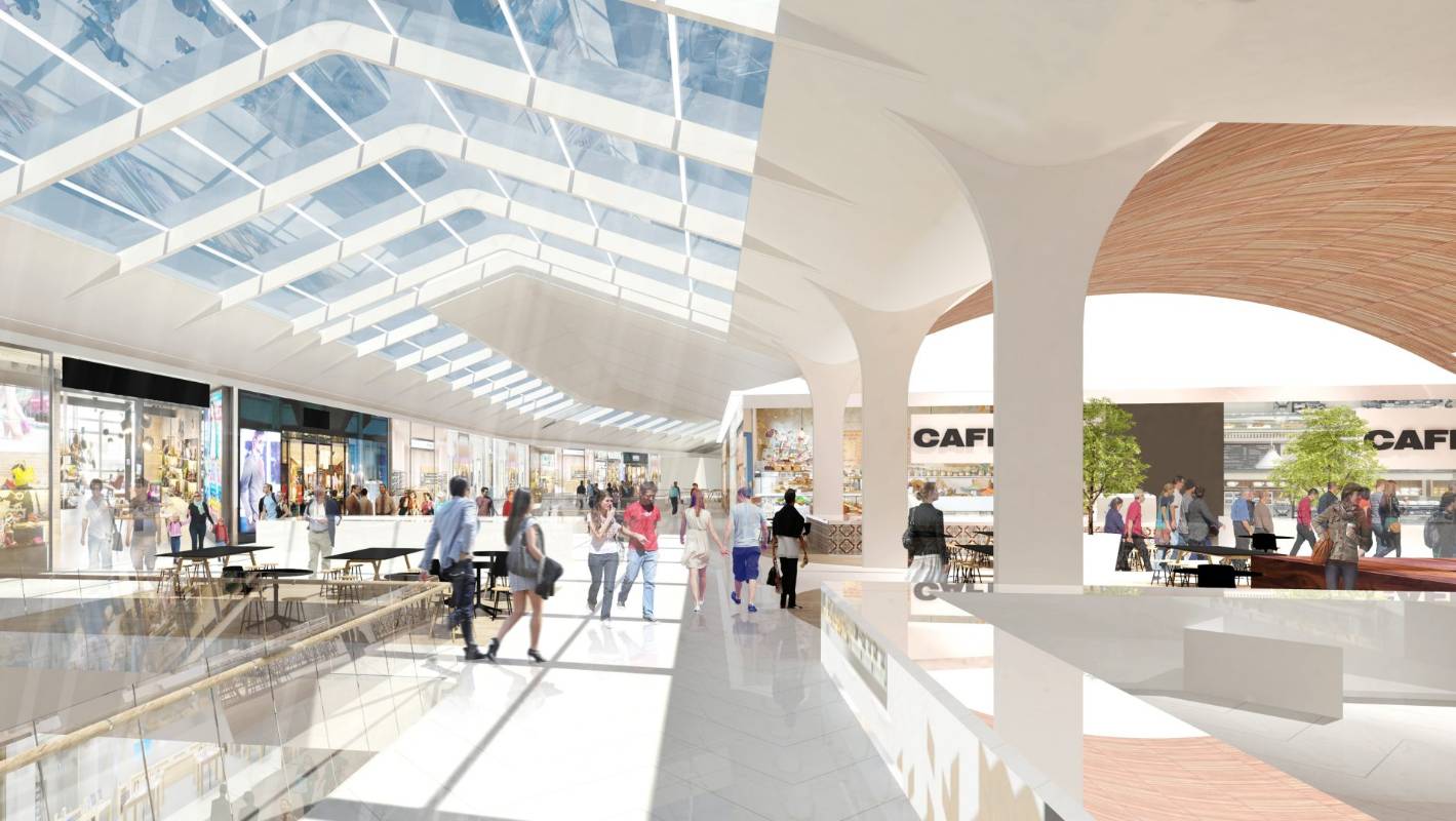 Mock up image of shopping mall interior, featuring white walls and a glass window ceiling